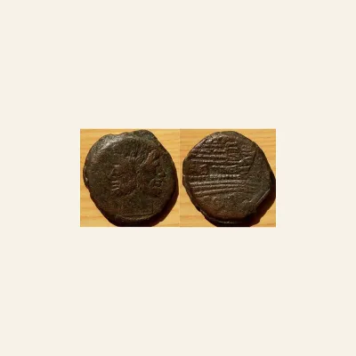 Reverse, of the as, for Republic Ae as : Head of Janus / Prow, mint of Rome