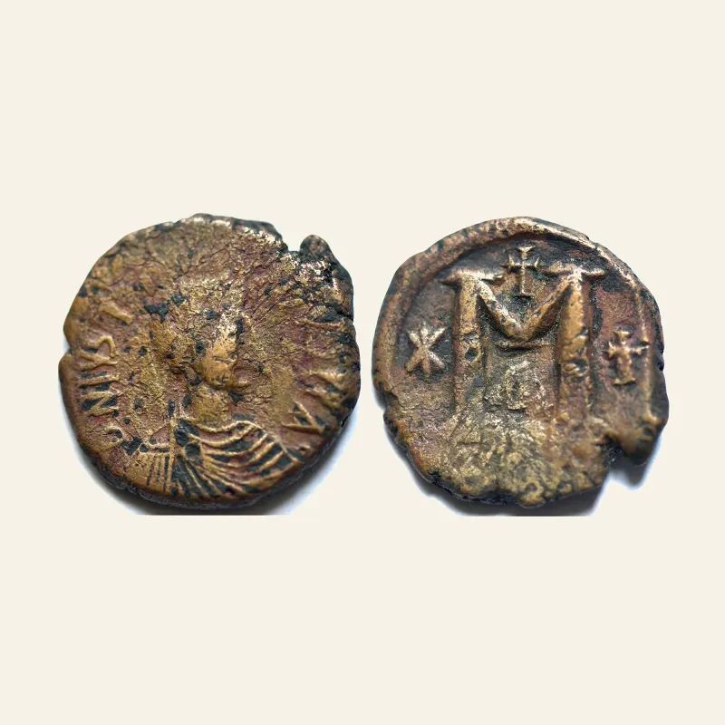 Obverse, of the follis, for Justinian I, 527-565 AD. Æ follis (30 mm ;16.94 gm) of Carthage., mint of Carthage, 565 AD
