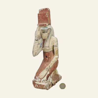 Reverse, for Mourning Isis kneeling figure in stuccoed and polychrome wood – Ptolemaic period – with certificate of...