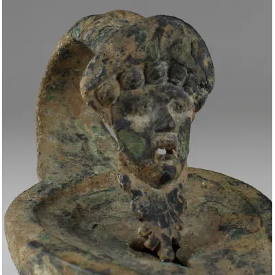 Avers, pour Romain — Lampe à huile with theatre mask handle — Ier siècle ap. J.-C., Ier siècle ap. J.-C.