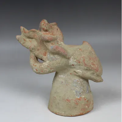 Avers, pour Grec — Figurine of a little Eros riding on a dolphin, holding a lyre with remains of polychromy — 4e - 3e siècle...