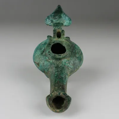 Obverse, for Greek, Hellenistic — Oil lamp. The handle is in the shape of a leaf and the lid as a seashell — 3rd - 2nd...