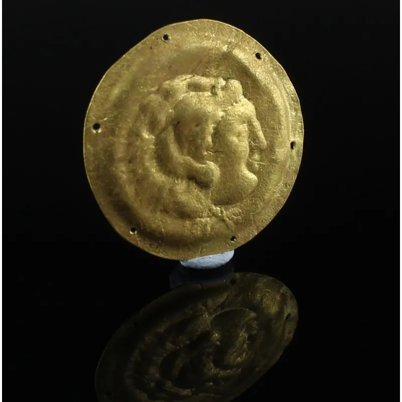 Avers, pour Greek, Hellenistic — Sheet applique with portrait of Alexander the Great as young Heracles, repoussé technique —...