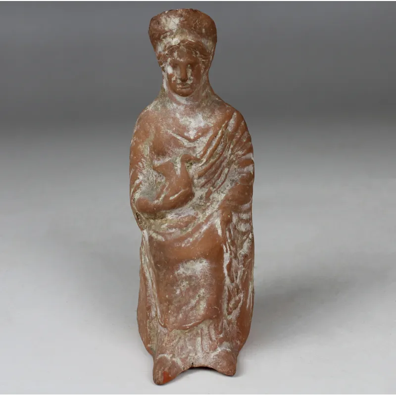 Obverse, for Greek, Hellenistic period — Statuette of a seated woman with bird — 3rd - 1st Century B.C, 3rd - 1st Century B.C