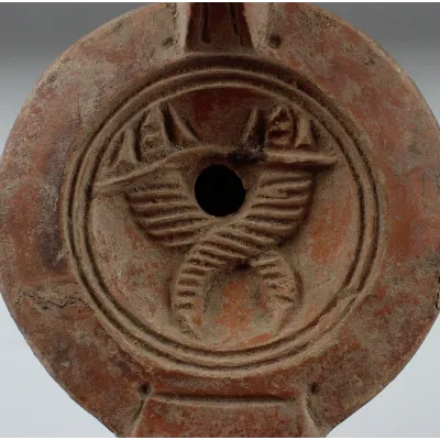 Avers, pour Romain — Factory Lampe à huile with cornucopias and makers stamp 'IVNIDRACO', Type Bussière D II 1 — 1e - 3e...