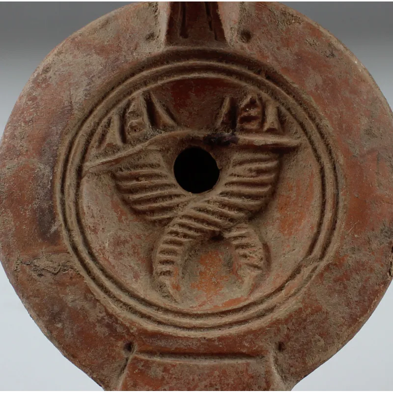 Avers, pour Romain — Factory Lampe à huile with cornucopias and makers stamp 'IVNIDRACO', Type Bussière D II 1 — 1e - 3e...