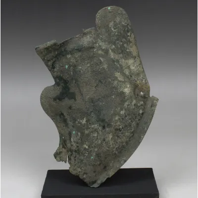 Avers, pour Romain — Military cheek piece of a helmet fragment — 2e - 3e siècle ap. J.-C., 2e - 3e siècle ap. J.-C.