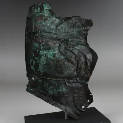 Obverse, for Roman — Military cheek piece of a helmet fragment with Jupiter's eagle — 3rd Century A.D, 3rd Century A.D