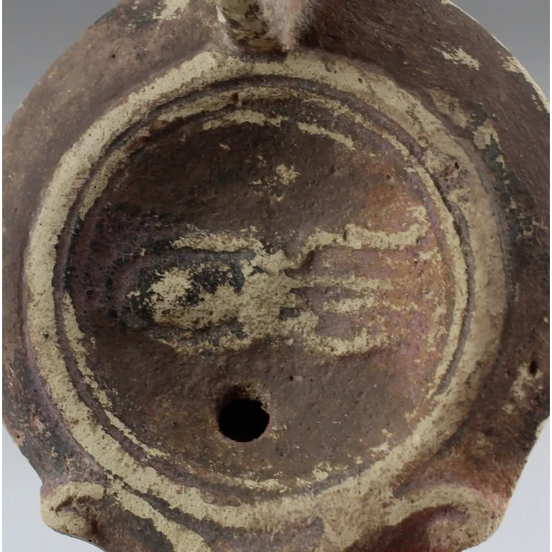 Obverse, for Roman — Oil lamp with a large cuttlefish (squid or octopus), Loeschcke Type 4. Mold-made — 1st Century A.D, 1st...