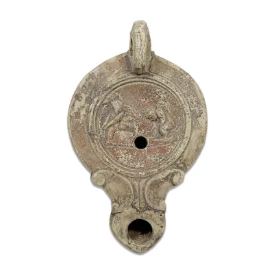 Avers, pour Romain — Lampe à huile with twin Eros — 1e - 3e siècle ap. J.-C., 1e - 3e siècle ap. J.-C.